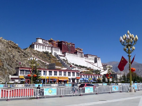 Potala Palace rising above Lhasa on Red Mountain Potala Palace rising above Lhasa on Red Mountain