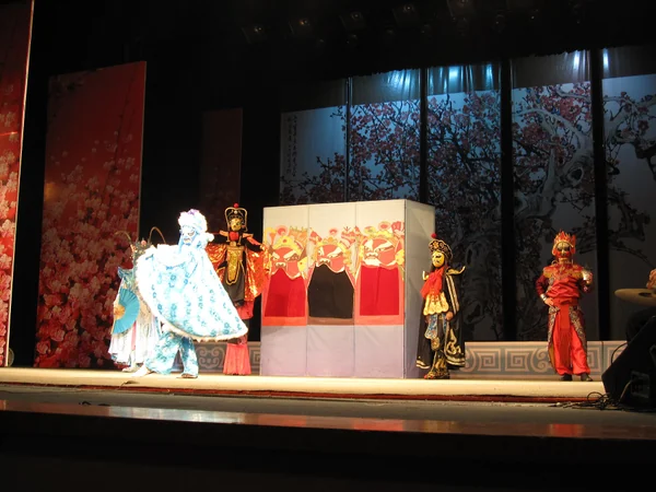 Sichuan opera performers presenting a traditional stage scene