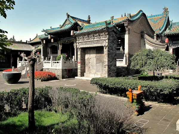 Green courtyard at a Daoist temple in Pingyao during the warmer season