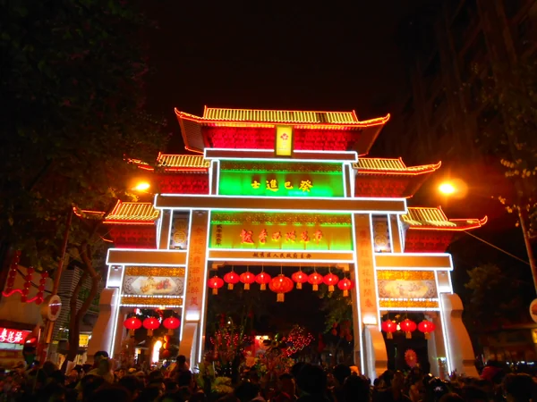 The illuminated entrance to a Guangzhou flower market