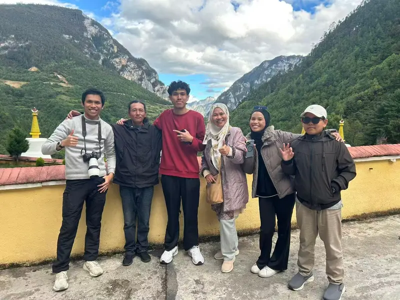 Small private travel group in a Tibetan mountain valley