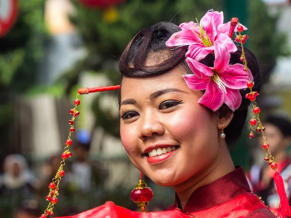 A performer dressed for a public Lunar New Year celebration