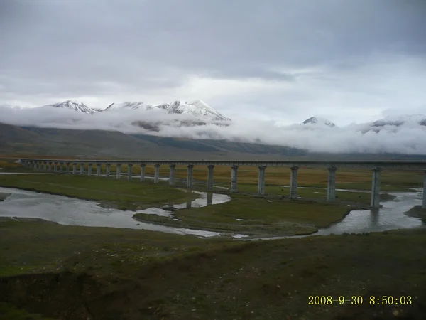 Elevated railway across high plateau wetlands