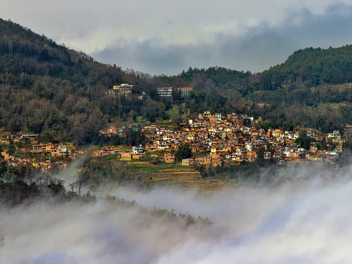 photographer at Yuanyang Rice Terraces — Yunnan Tours