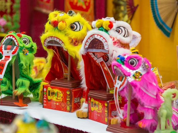 Lion dance puppets displayed at a Chinese New Year event in Edmonton
