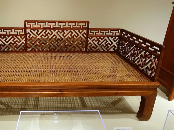 Late Ming or early Qing huanghuali couch with woven cane surface