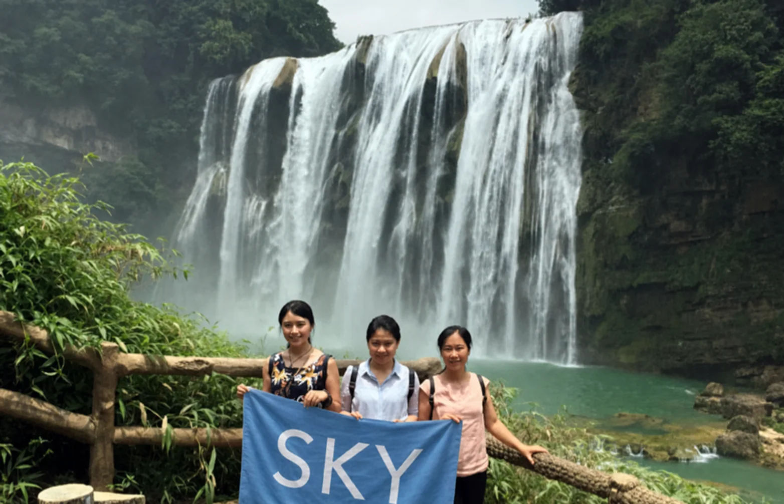 YUNSKY travelers with a blue SKY flag in Guizhou