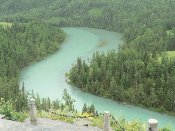 Moon Bay in Kanas, Xinjiang, during early autumn Moon Bay in Kanas, Xinjiang, during early autumn