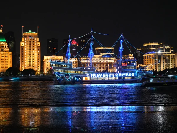 Passenger cruise on the Huangpu River with the Shanghai skyline Passenger cruise on the Huangpu River with the Shanghai skyline
