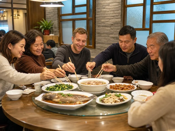 Friends sharing family-style dishes in a contemporary Chinese restaurant Friends sharing family-style dishes in a contemporary Chinese restaurant