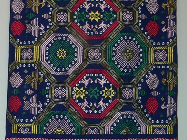Detailed Chinese silk brocade woven with colored threads