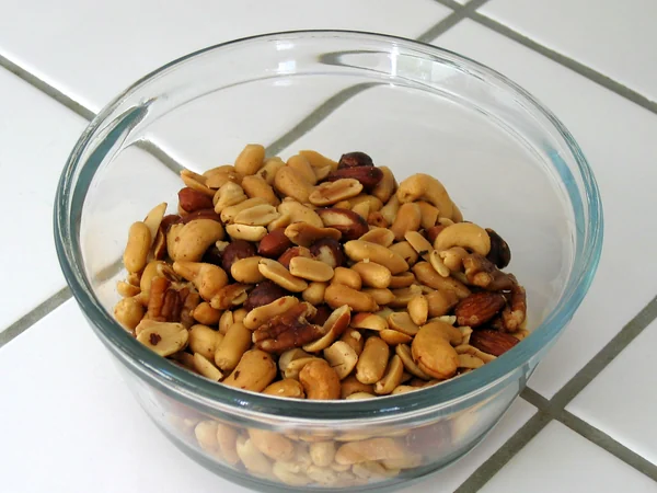A bowl of mixed nuts ready to serve as a snack A bowl of mixed nuts ready to serve as a snack