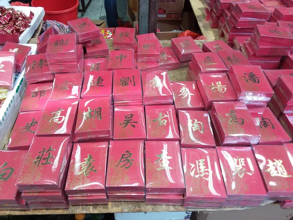 Red lucky envelopes displayed at a Lunar New Year stall in Hong Kong