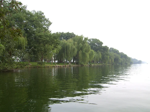 Spring trees and lakeside scenery at West Lake in Hangzhou Spring trees and lakeside scenery at West Lake in Hangzhou