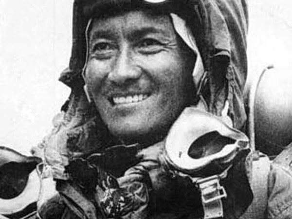 Tenzing Norgay in mountaineering clothing in a 1953 portrait