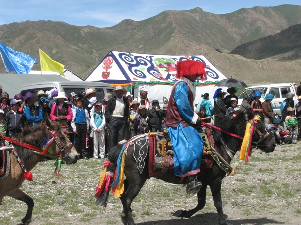 Seasonal Tibetan festival gathering connected with the traditional calendar