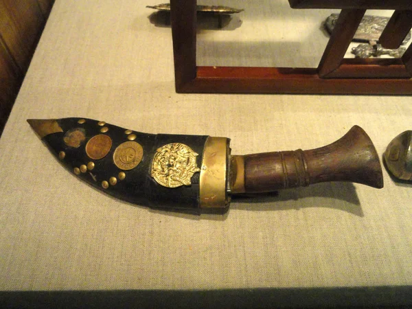 Decorated Tibetan knife and engraved sheath shown safely Decorated Tibetan knife and engraved sheath shown safely