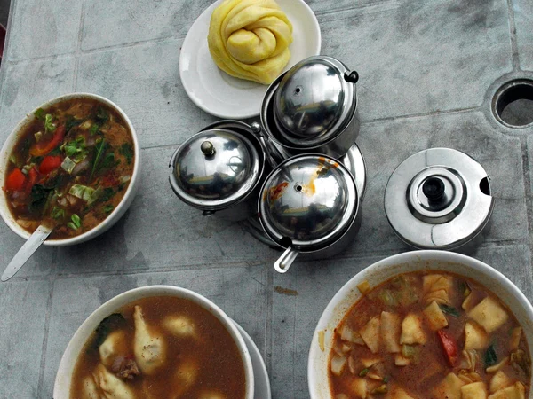 Hot Tibetan noodle soup served with vegetables Hot Tibetan noodle soup served with vegetables