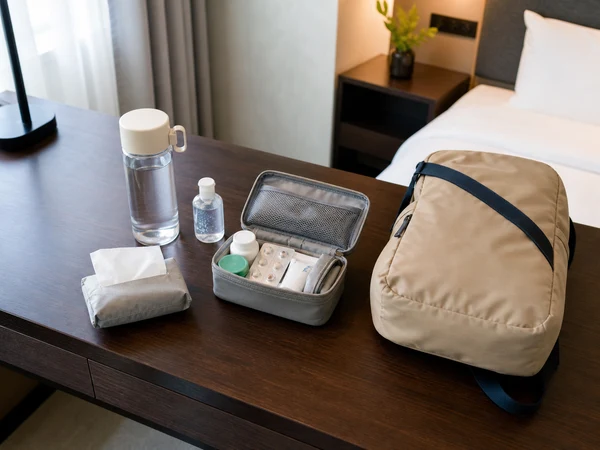 Reusable bottle, tissues and personal travel essentials prepared in a China hotel room