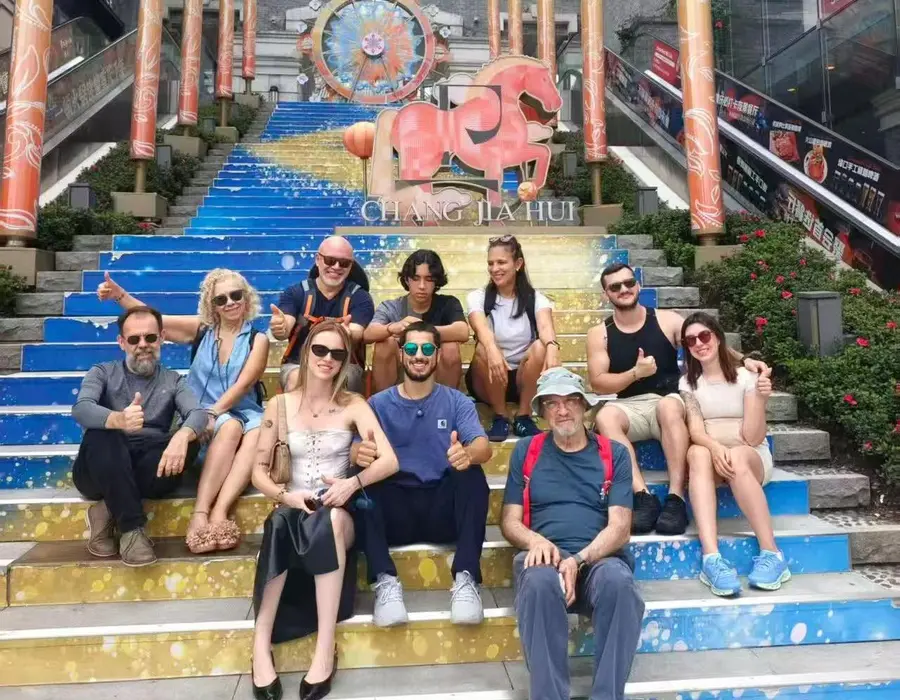 YUNSKY travelers enjoying a colorful cultural site in China