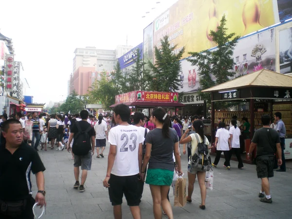 A busy Beijing pedestrian street illustrating the awareness needed in any large city