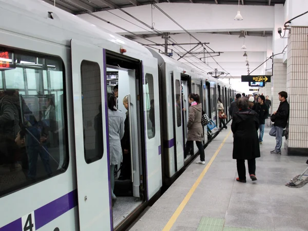 A Shanghai metro station where bilingual signs help non-Chinese speakers navigate
