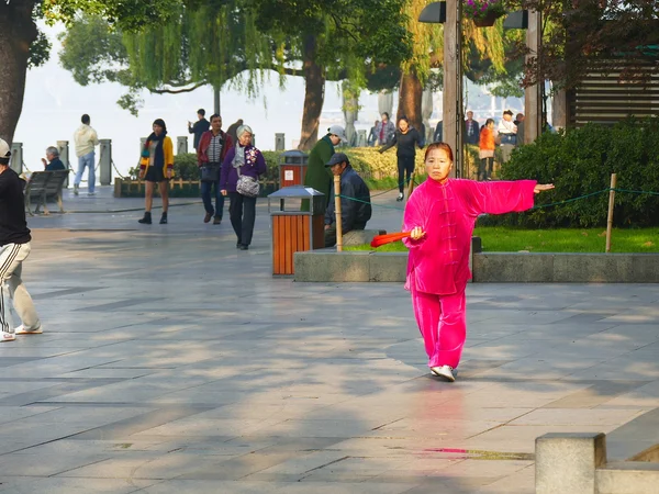 Morning tai chi in a Chinese public park, one of the everyday experiences worth slowing down for