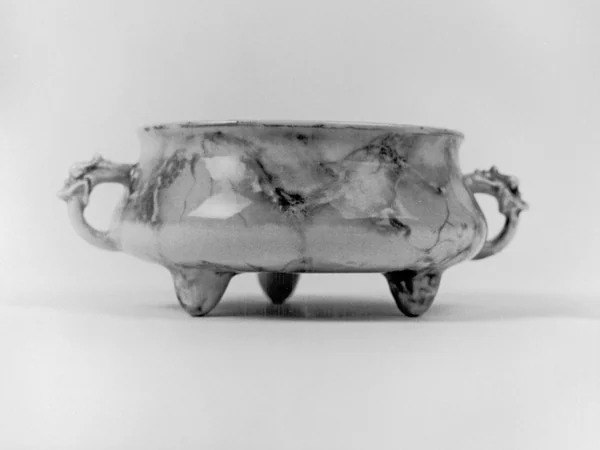 Historic incense burner decorated with Chinese dragon forms Historic incense burner decorated with Chinese dragon forms