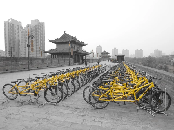 Cyclists and visitors on Xi’an City Wall during summer