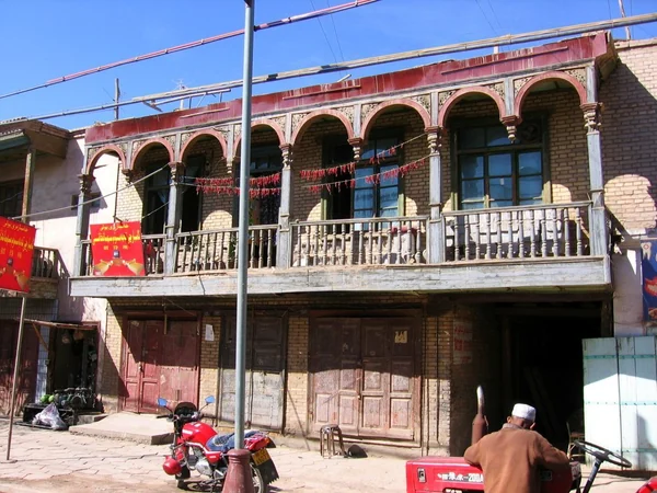 Pedestrian street and traditional buildings in Kashgar Old City Pedestrian street and traditional buildings in Kashgar Old City