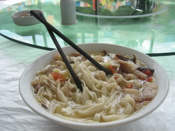 Bowl of Yunnan noodles photographed at a restaurant in China Bowl of Yunnan noodles photographed at a restaurant in China