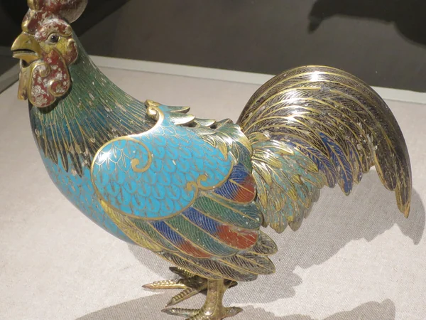 A Qing dynasty cloisonne incense burner shaped as a rooster A Qing dynasty cloisonne incense burner shaped as a rooster
