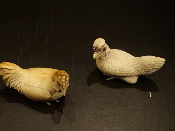 Qing dynasty Chinese ivory figures of a rooster and hen Qing dynasty Chinese ivory figures of a rooster and hen