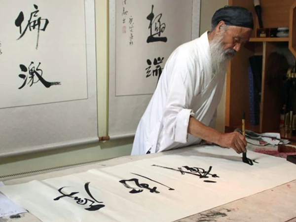 Chinese calligrapher writing traditional characters