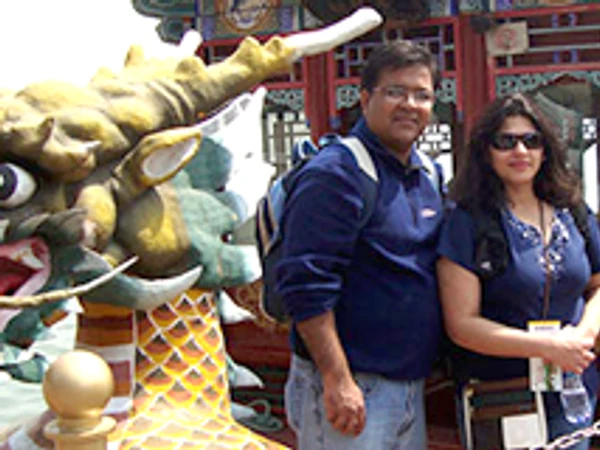 Indian family visiting a traditional Chinese landmark