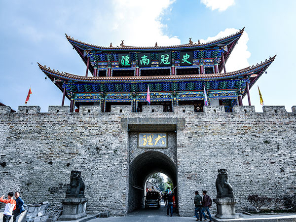 Dali Old Town gate with a tiled pavilion above its stone arch