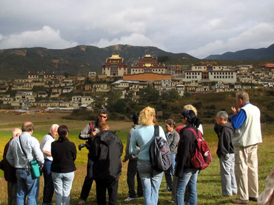 International travelers viewing Songzanlin Monastery in Shangri-La