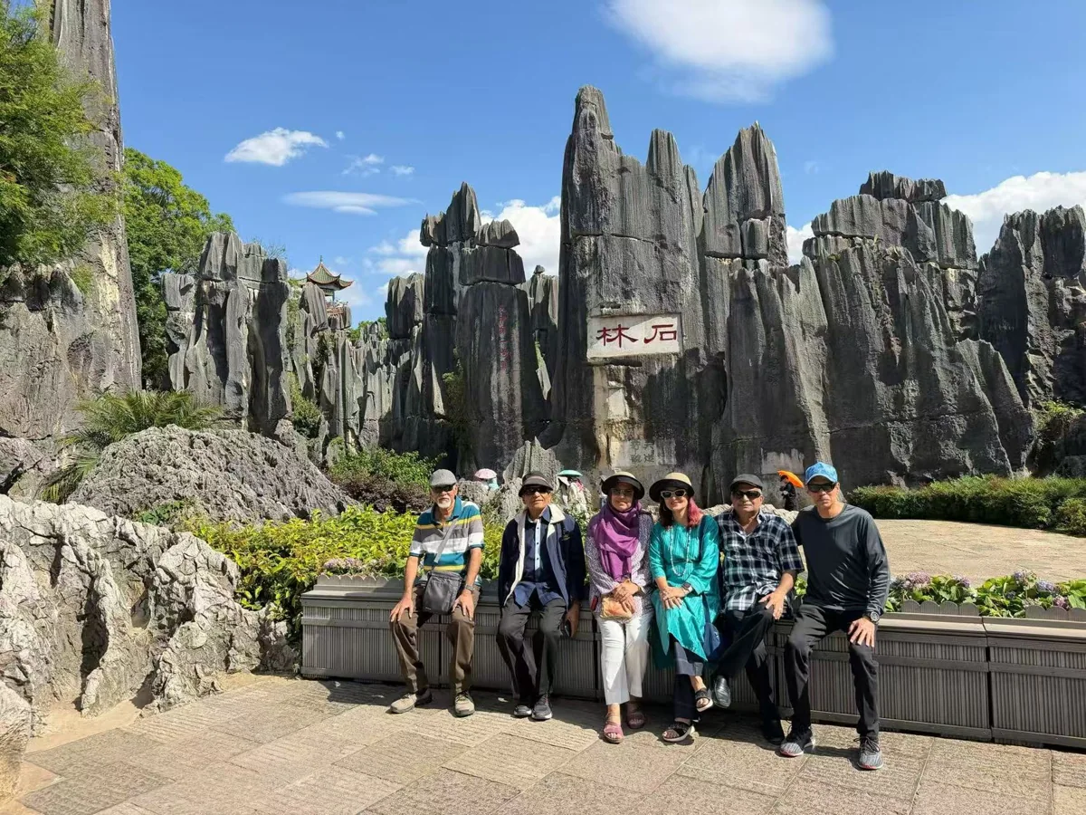 Travellers visiting the Stone Forest near Kunming