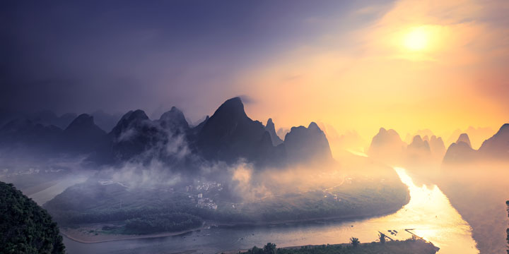 Sunrise over the Li River karst landscape from Xianggong Hill Sunrise over the Li River karst landscape from Xianggong Hill