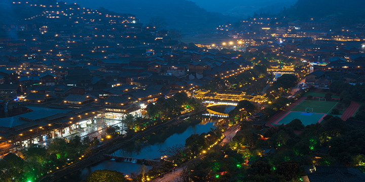Xijiang village lights after dusk from a public overlook Xijiang village lights after dusk from a public overlook