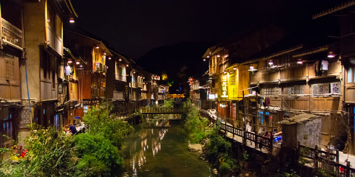 Zhaoxing village lights and timber buildings at night Zhaoxing village lights and timber buildings at night