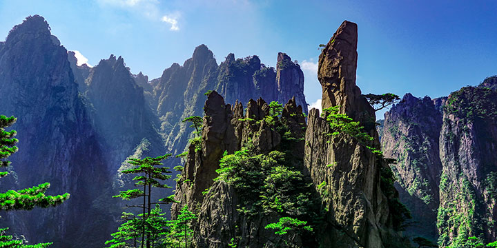Granite rock formations and forest on Mount Huangshan Granite rock formations and forest on Mount Huangshan