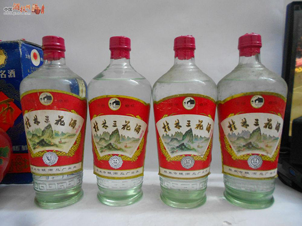 Clear glass bottles of Guilin Sanhua liquor with Chinese labels