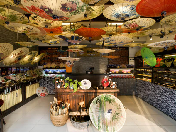 Handmade oil-paper umbrellas displayed in a Guilin craft shop Handmade oil-paper umbrellas displayed in a Guilin craft shop