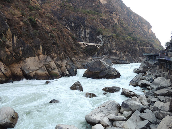 Fast-flowing Jinsha River inside Tiger Leaping Gorge
