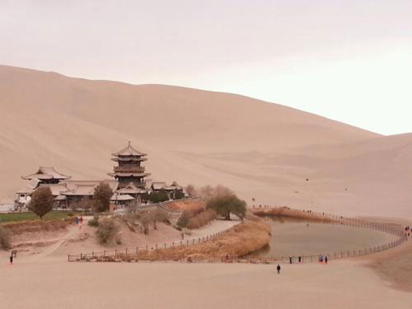Mingsha dunes and Crescent Spring near Dunhuang on the ancient Silk Road Mingsha dunes and Crescent Spring near Dunhuang on the ancient Silk Road