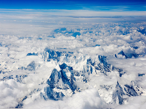 Aerial view of snow-covered Himalayan peaks in winter Aerial view of snow-covered Himalayan peaks in winter